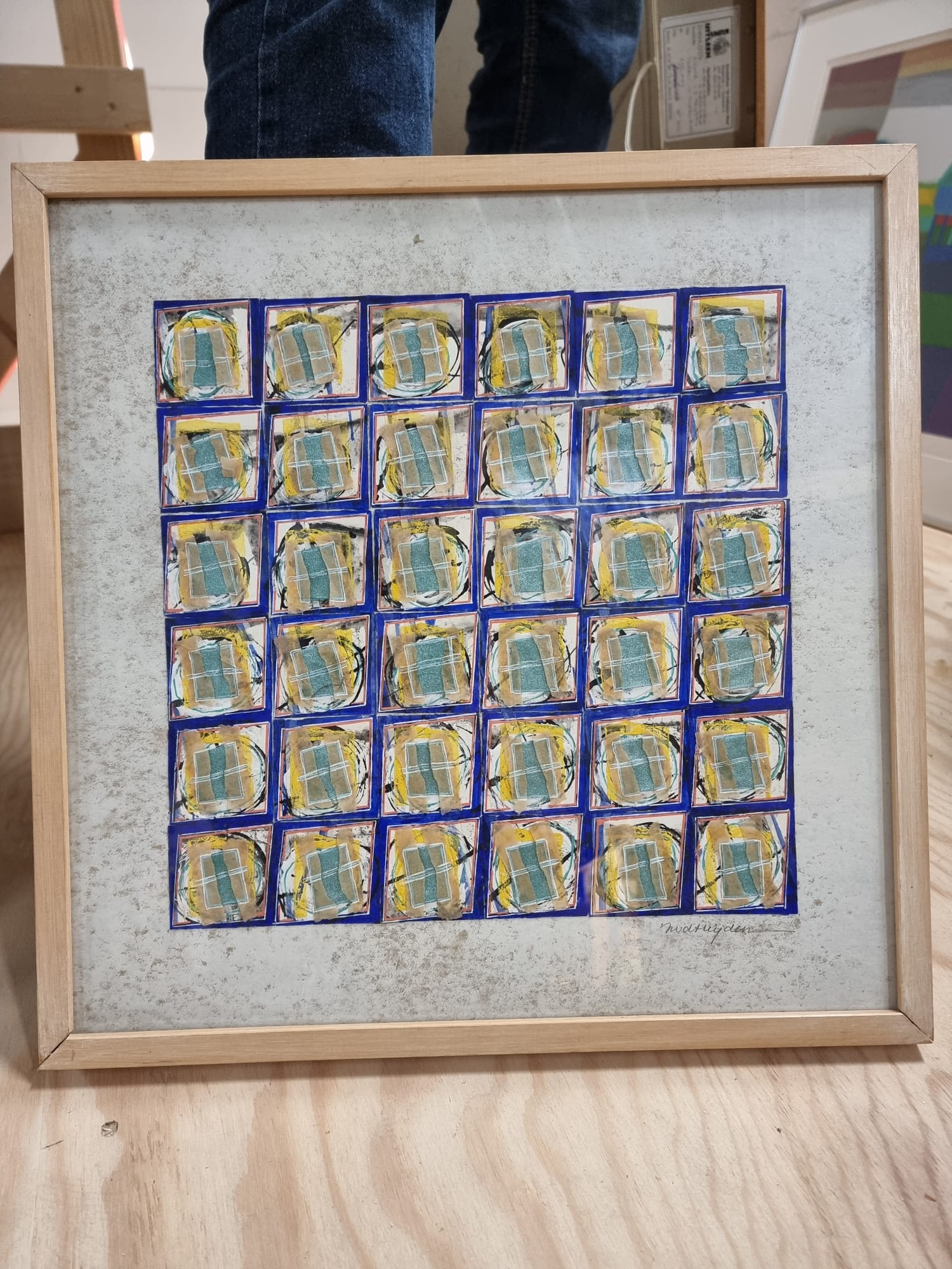 Vierkanten in blauw veld